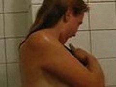 Golden-haired taking a shower