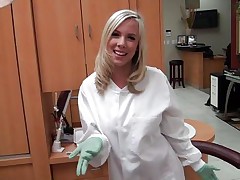 glamorous blond dentist gives a blowjob